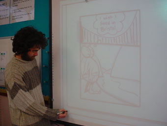 Simon demonstrating comic-book technique on the white-board at Avon Primary (Dympna Leonard). 