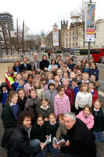 Bristol school pupils in the city centre to see their Portrait of a Nation banners on display. Adrian Tinniswood, Chair of  Heritage Lottery Fund South West, is the tall gentleman standing at the rear (Martin Chainey).