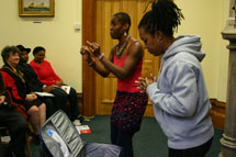 Ruth Pitter and Valerie Mower performing an extract from the Our Stories Make Waves' assembly on migration at the Bristol launch (Laura Thorne).