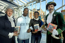 Michael Wood, Town Crier for Hull, and Terry Fisher, as Hull MP and abolitionist William Wilberforce, with Hull residents in Princes' Quay Shopping Centre on launch day.